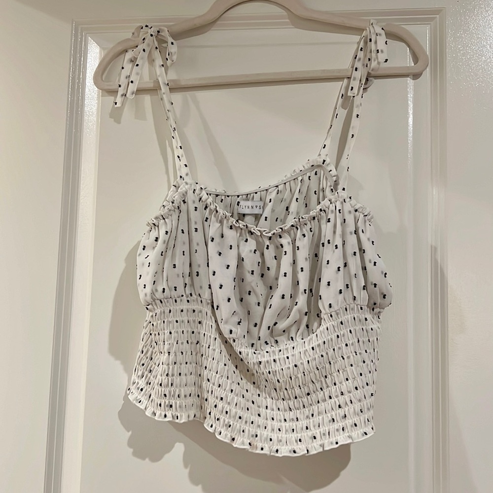 White crop top with black polka dots